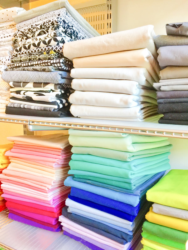 Neatly folded colorful linens